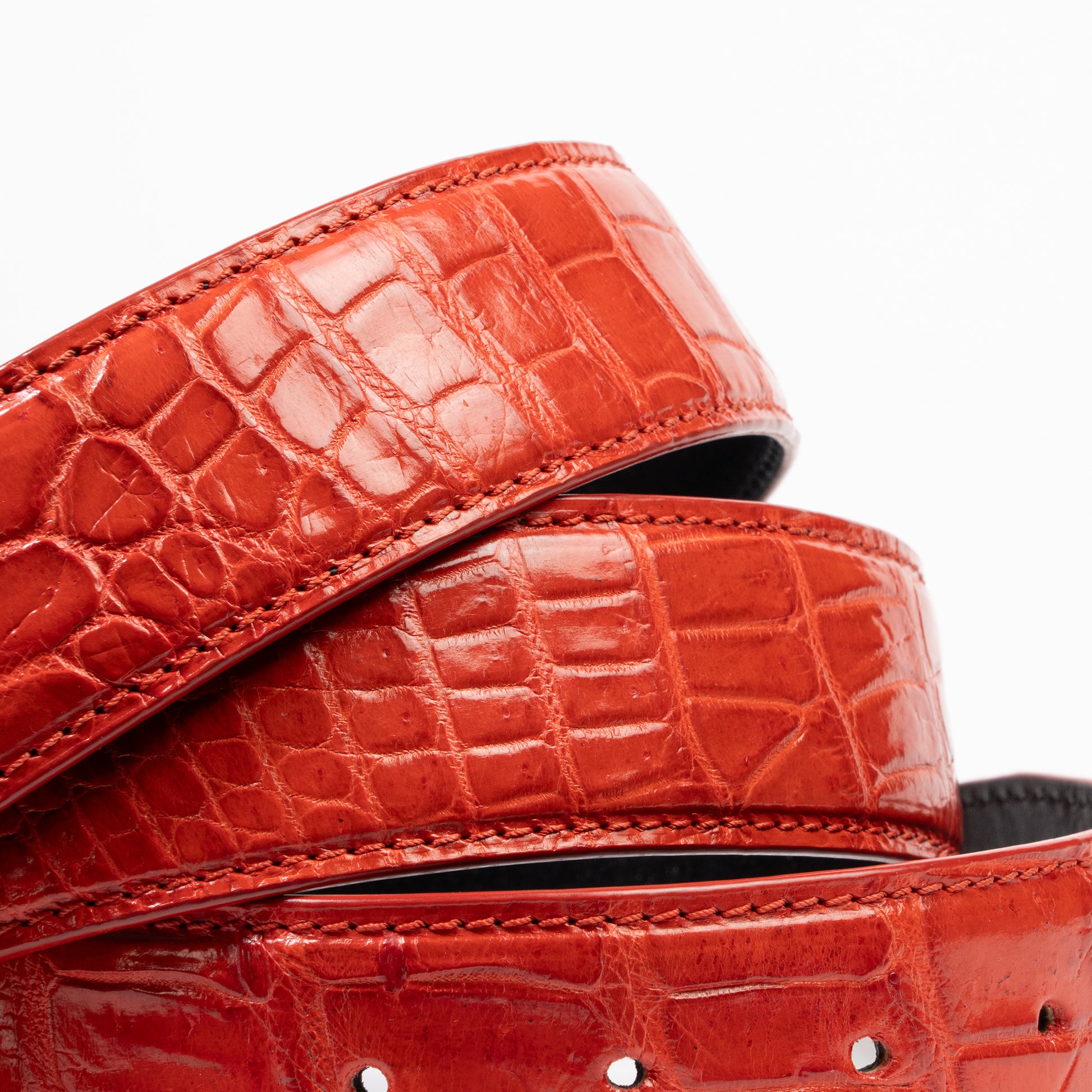 red crocodile leather detail photograph 