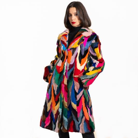 model wearing a real multi color mink fur coat 