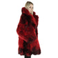 Side view of model wearing red and black fur coat 