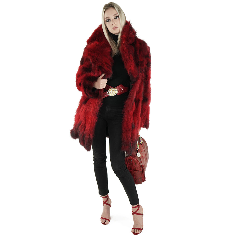 Blonde woman with real fur coat and python handbag
