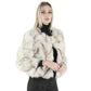 blonde woman wearing a cheap fox fur coat 