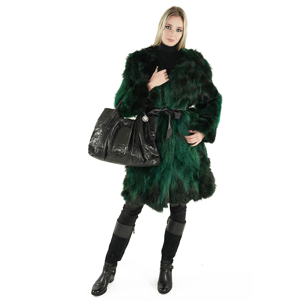 woman wearing a green fur coat and black python handbag from sherrill brothers 