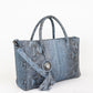 Blue luxury handbag with tassel and medallion 