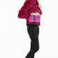 woman with pink genuine python handbag from Sherrill Bros 