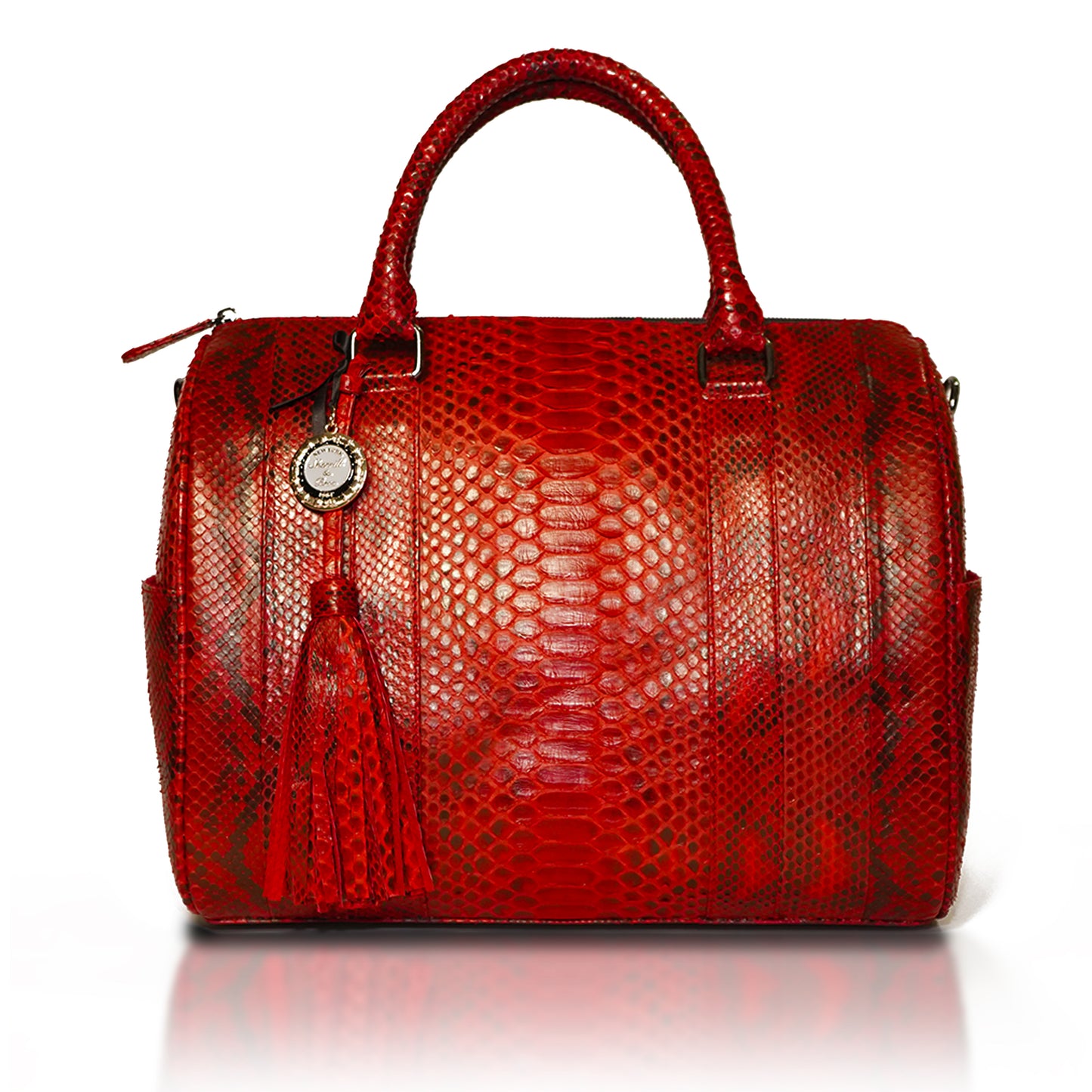 red python duffel handbag with tube handles and tassel from Sherrill Bros